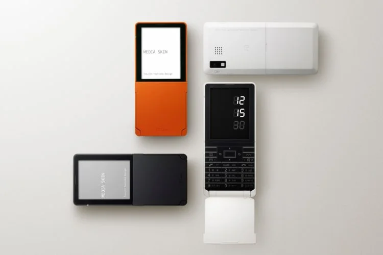 au media skin ブラック MEDIA SKIN（au Design project） カラー名称：オレンジ、ブラック